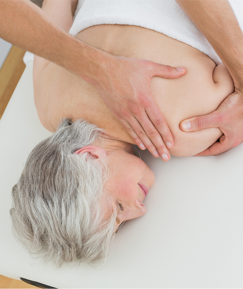 older woman taking a massage